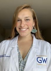 Picture of Sarah Kleb, wearing a GW lab coat