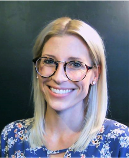 Headshot style photo of Jaclyn Brennan, PhD. She is smiling. 